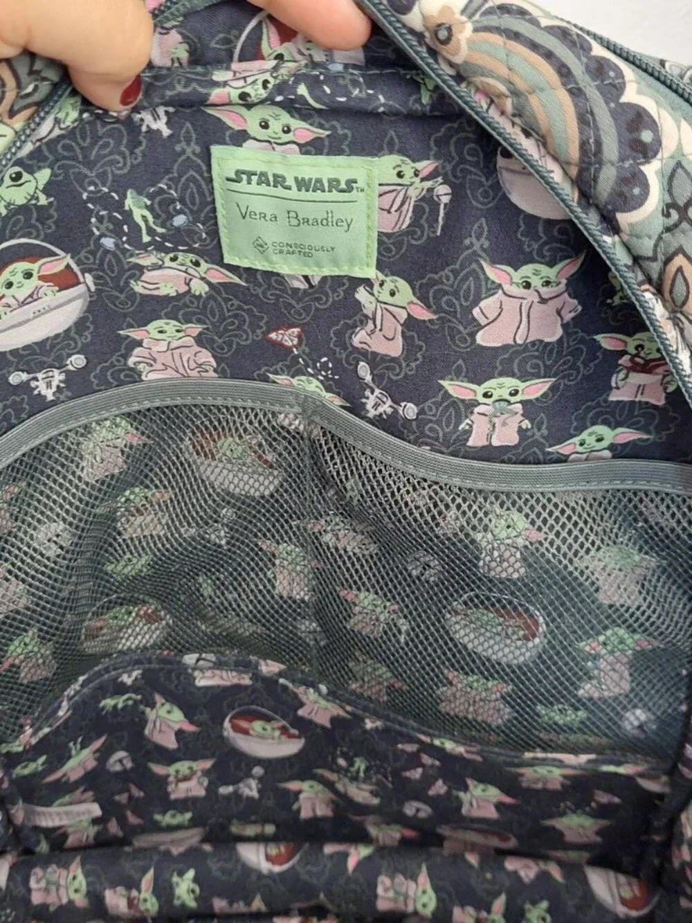 Vera Bradley Star Wars Grogu medallion backpack with repeating cartoon character